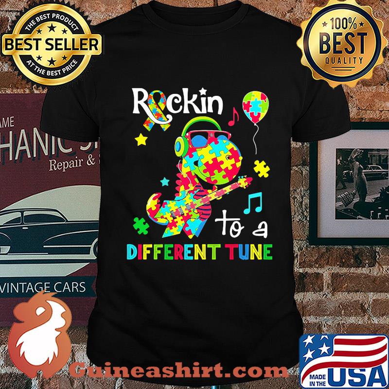 Dinosaur T Rex Rockin to a different tune Autism awareness shirt