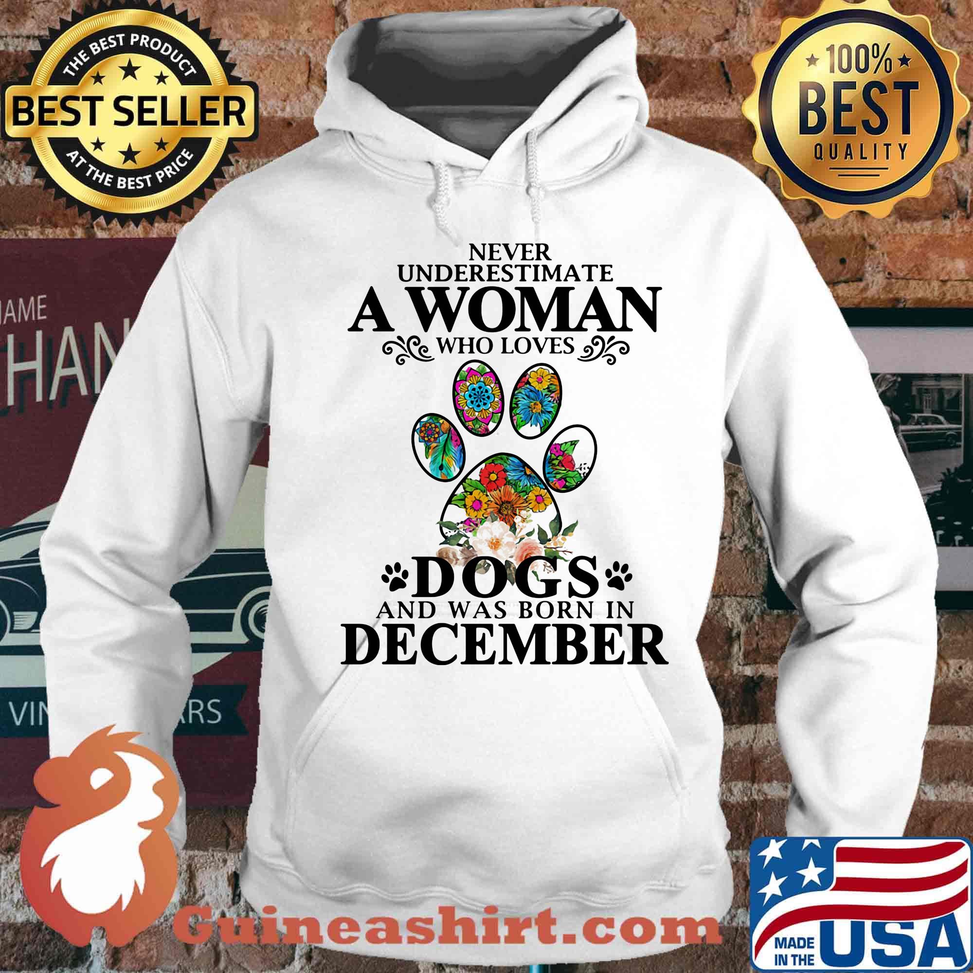 Never underestimate an old woman who loves dogs paw and was born in december s Hoodie