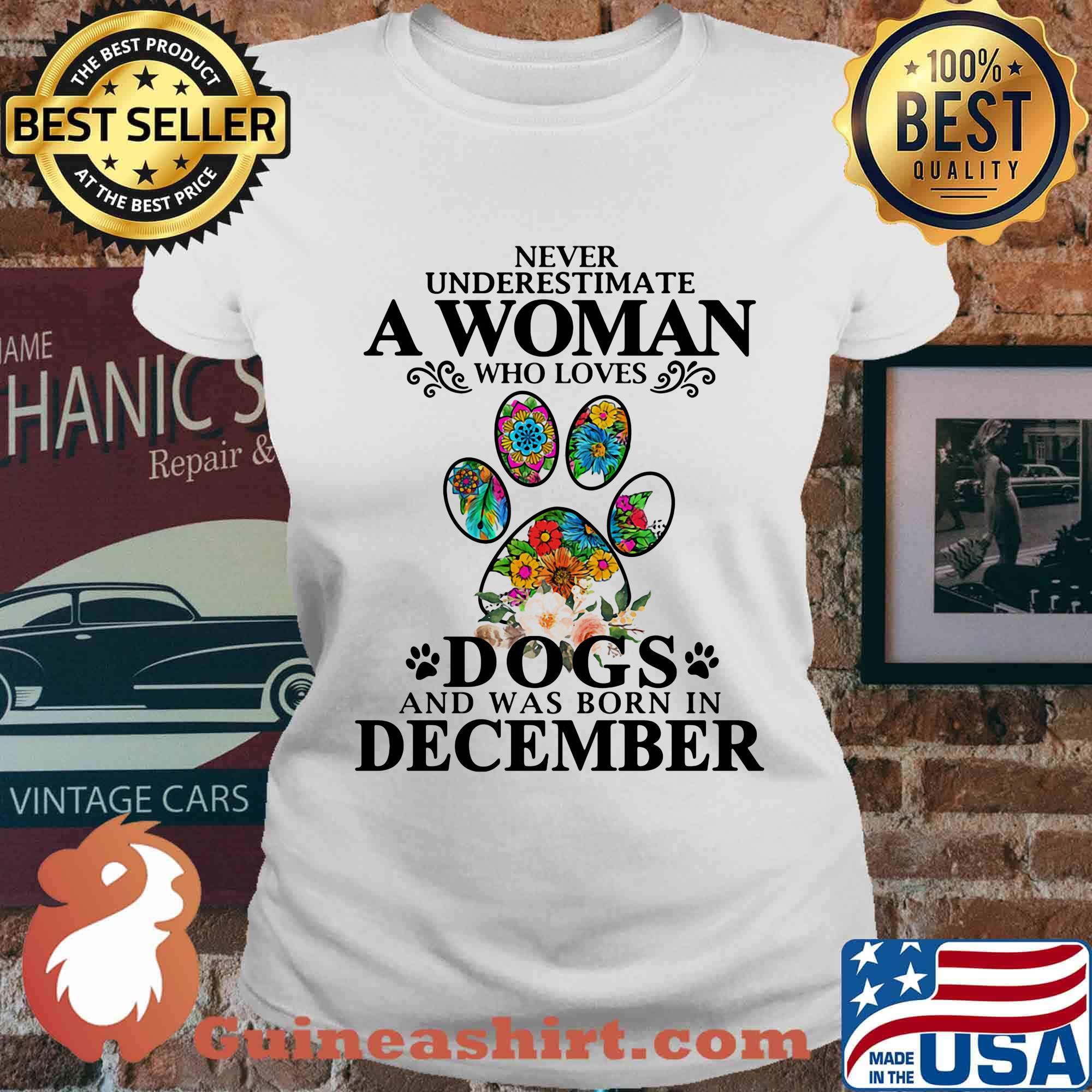 Never underestimate an old woman who loves dogs paw and was born in december s Ladies tee