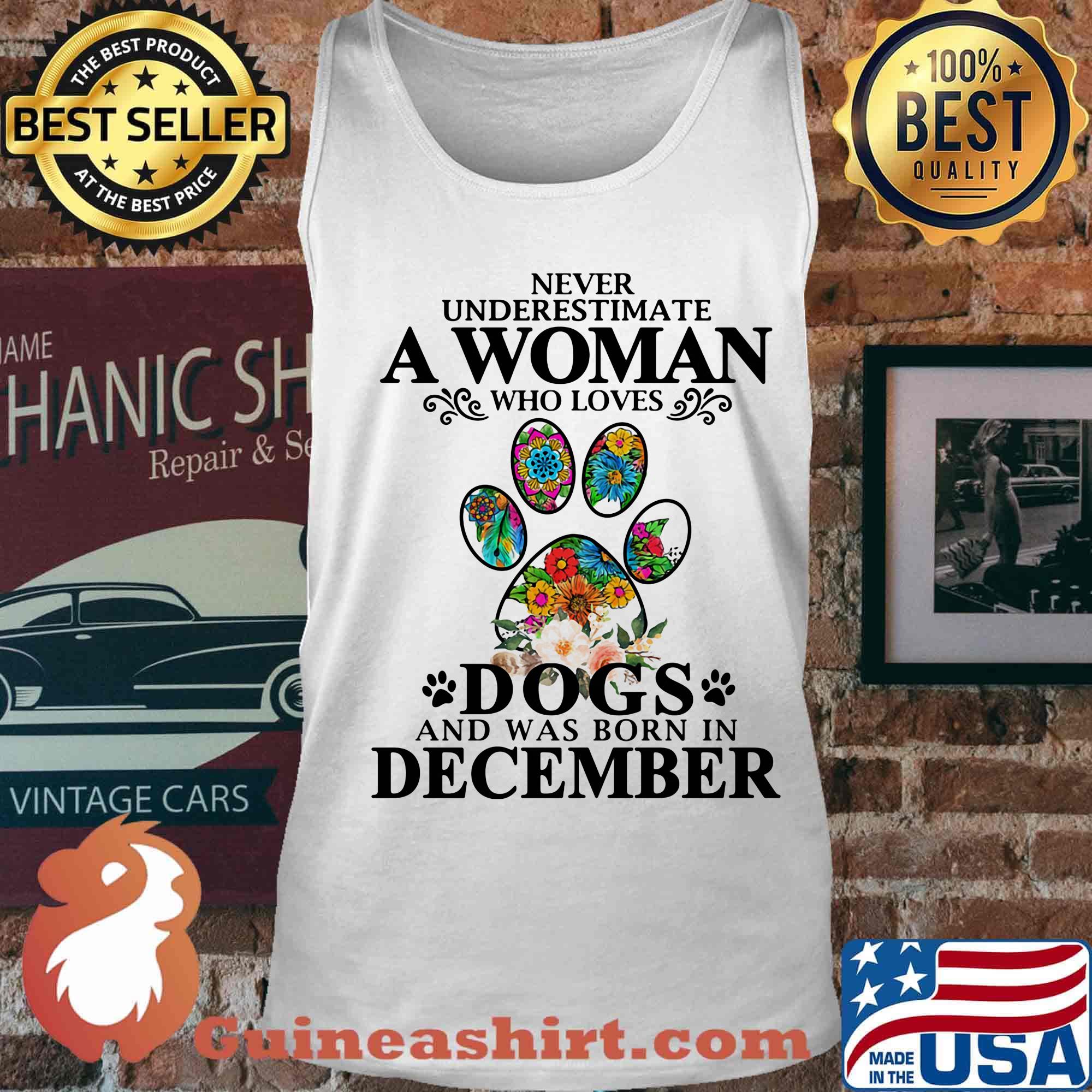 Never underestimate an old woman who loves dogs paw and was born in december s Tank top