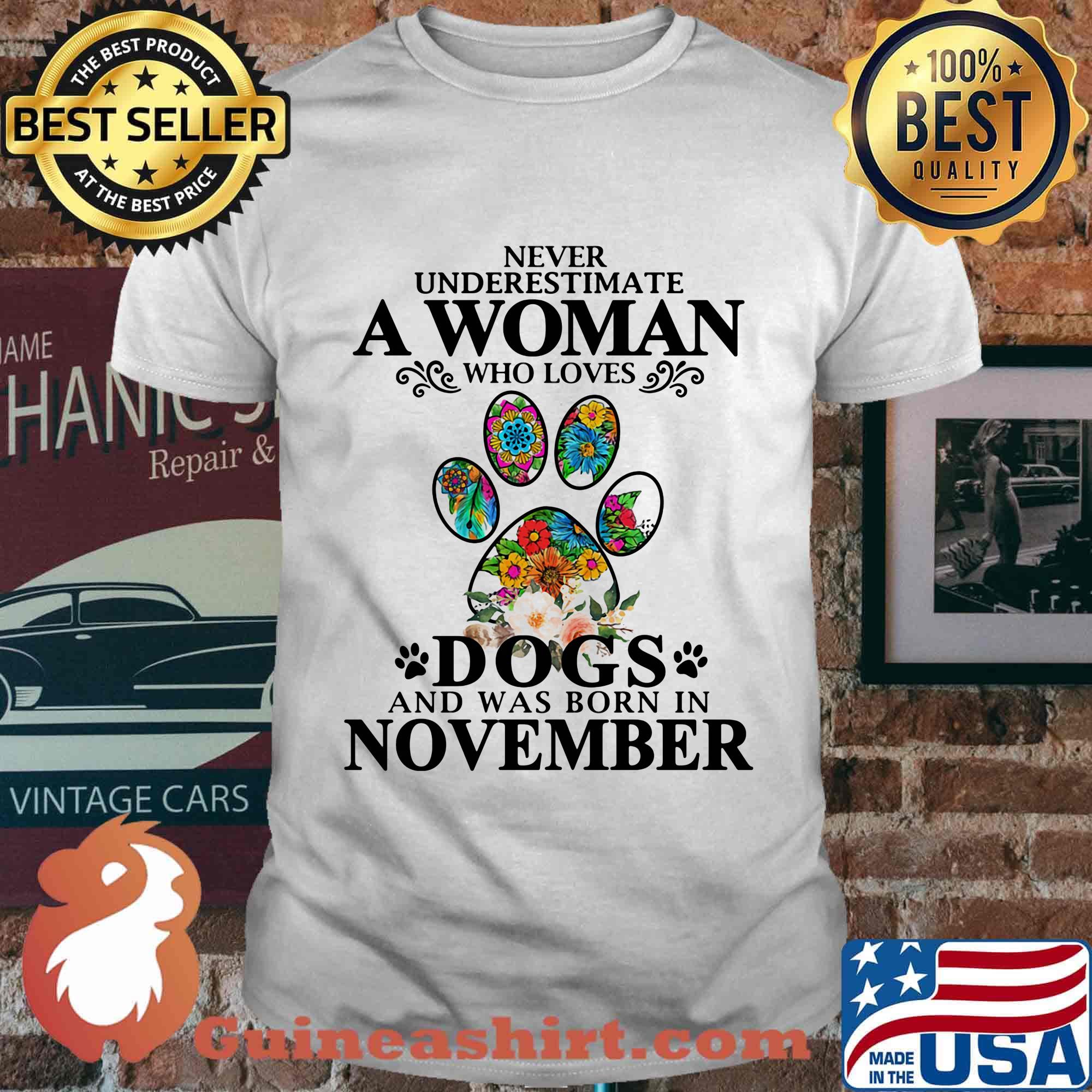 Never underestimate an old woman who loves dogs paw and was born in november shirt