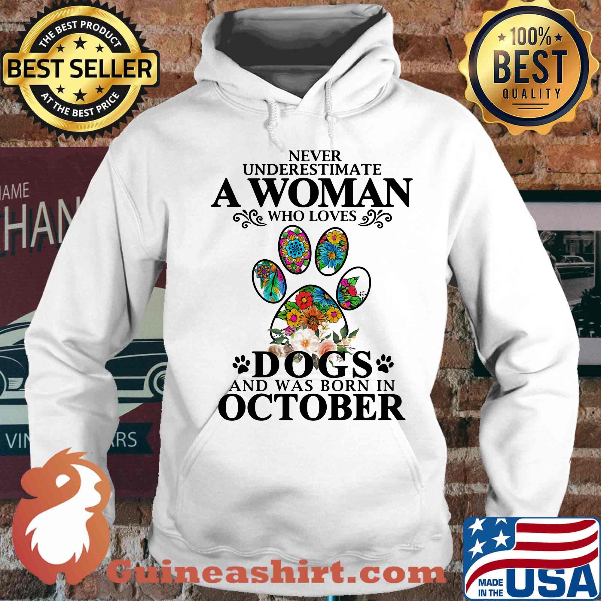 Never underestimate an old woman who loves dogs paw and was born in october s Hoodie