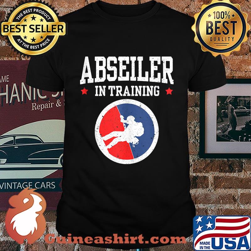 Abseiler in training stars shirt