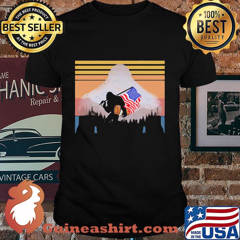 Bigfoot holding american flag independence day vintage retro shirt