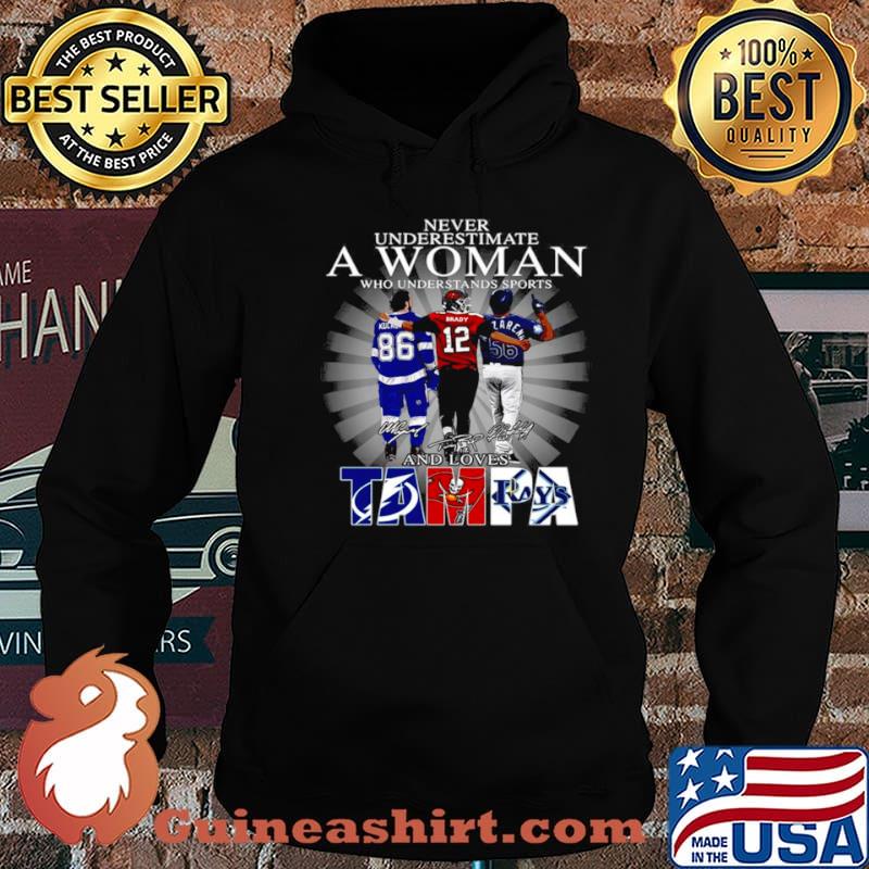 Never underestimate a woman who understands sports Tampa Bay Lightning Tampa Bay Buccaneers Tampa Bay Rays signatures shirt