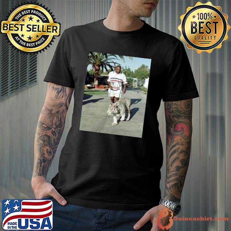Champion Boxer walking his tiger shirt