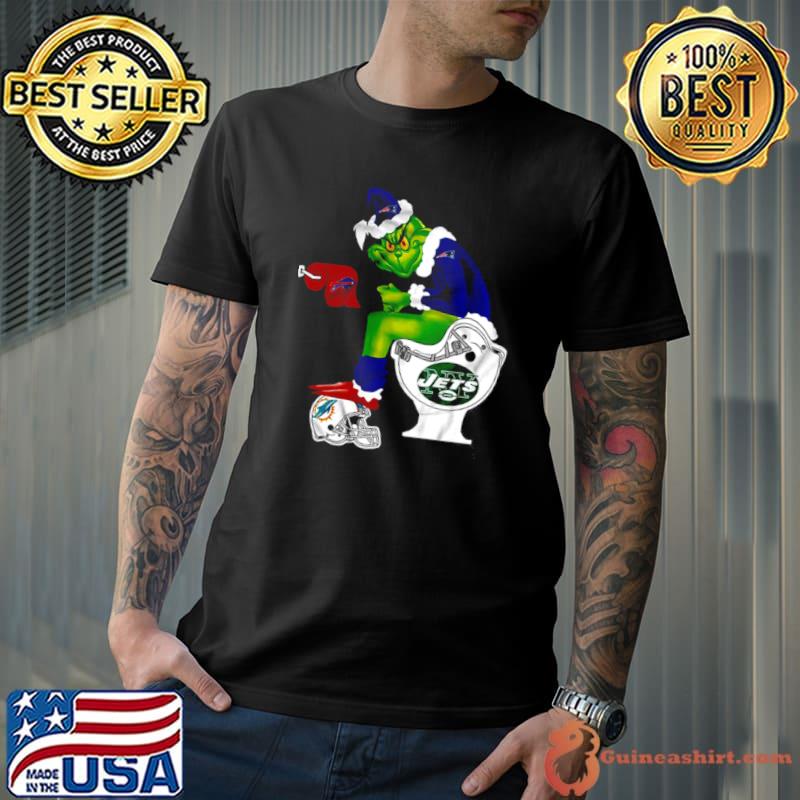 New England Patriots Grinch Sitting On New York Jets Toilet And Step On Miami Dolphins Helmet Shirt