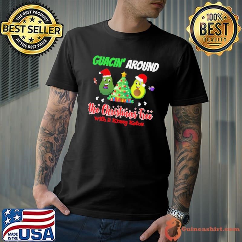 Guacin around the Christmas tree with 2KK shirt